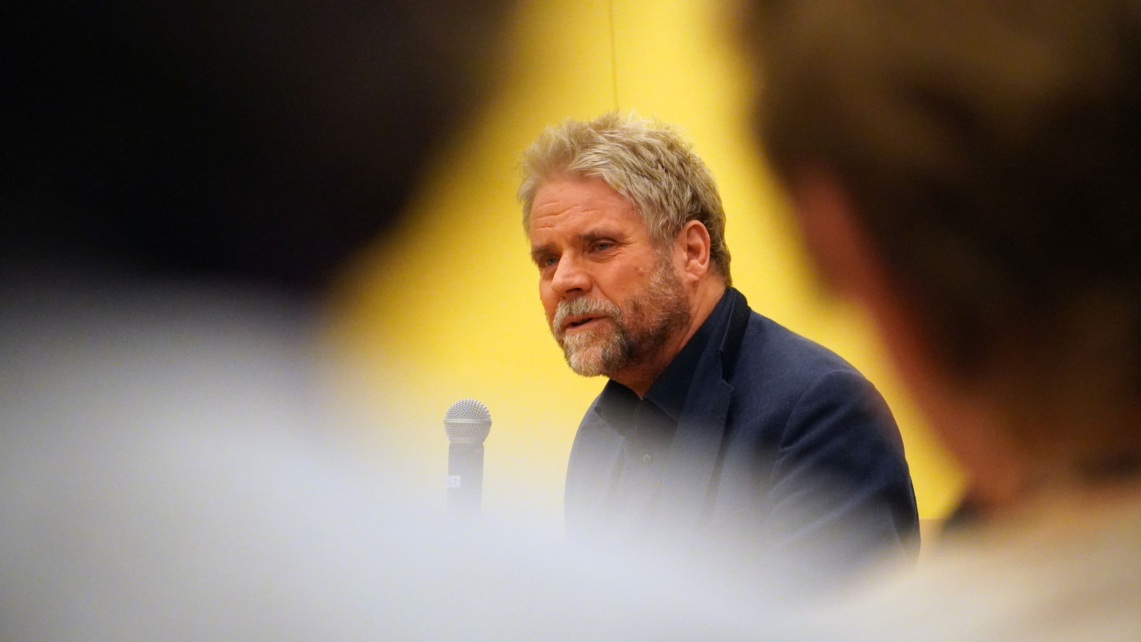 Martin Plümicke on stage at the Cannstatter Forum