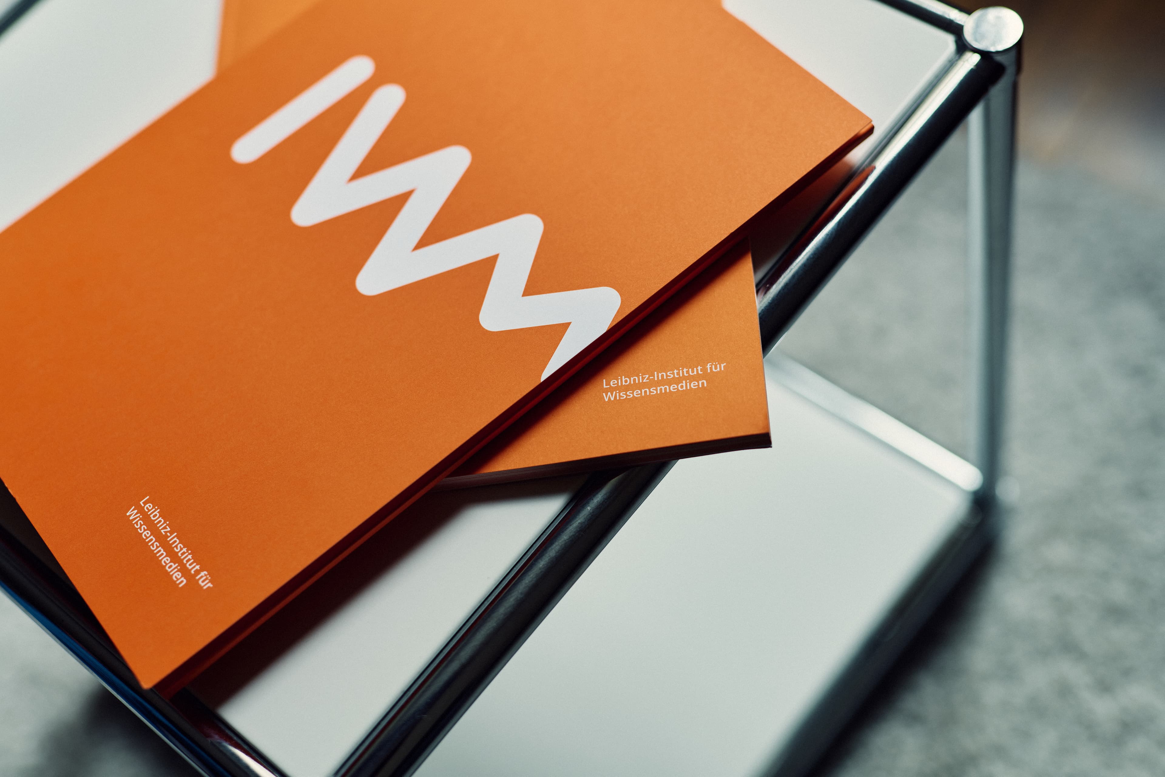 Two folders with the IWM symbol