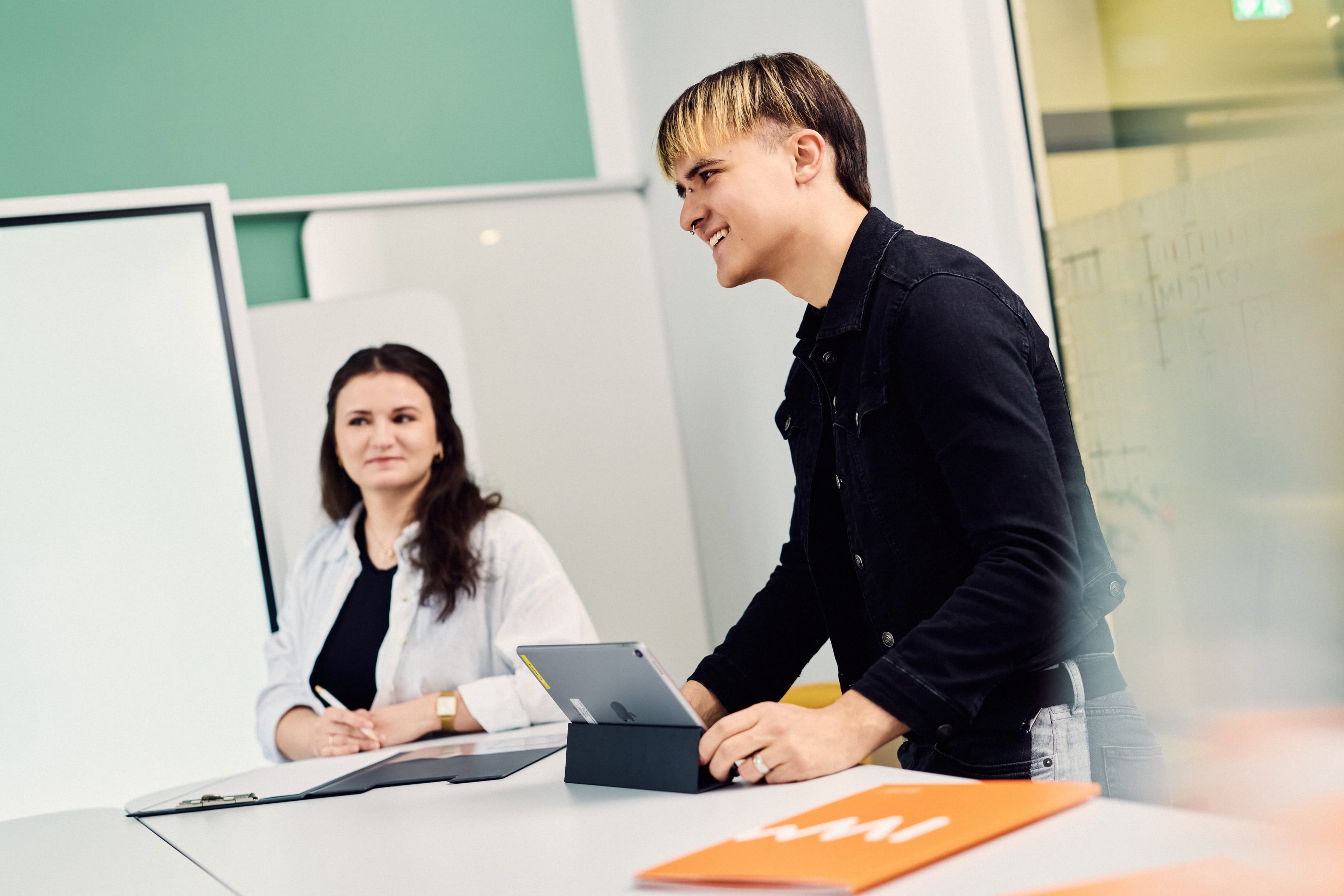 Two IWM employees working