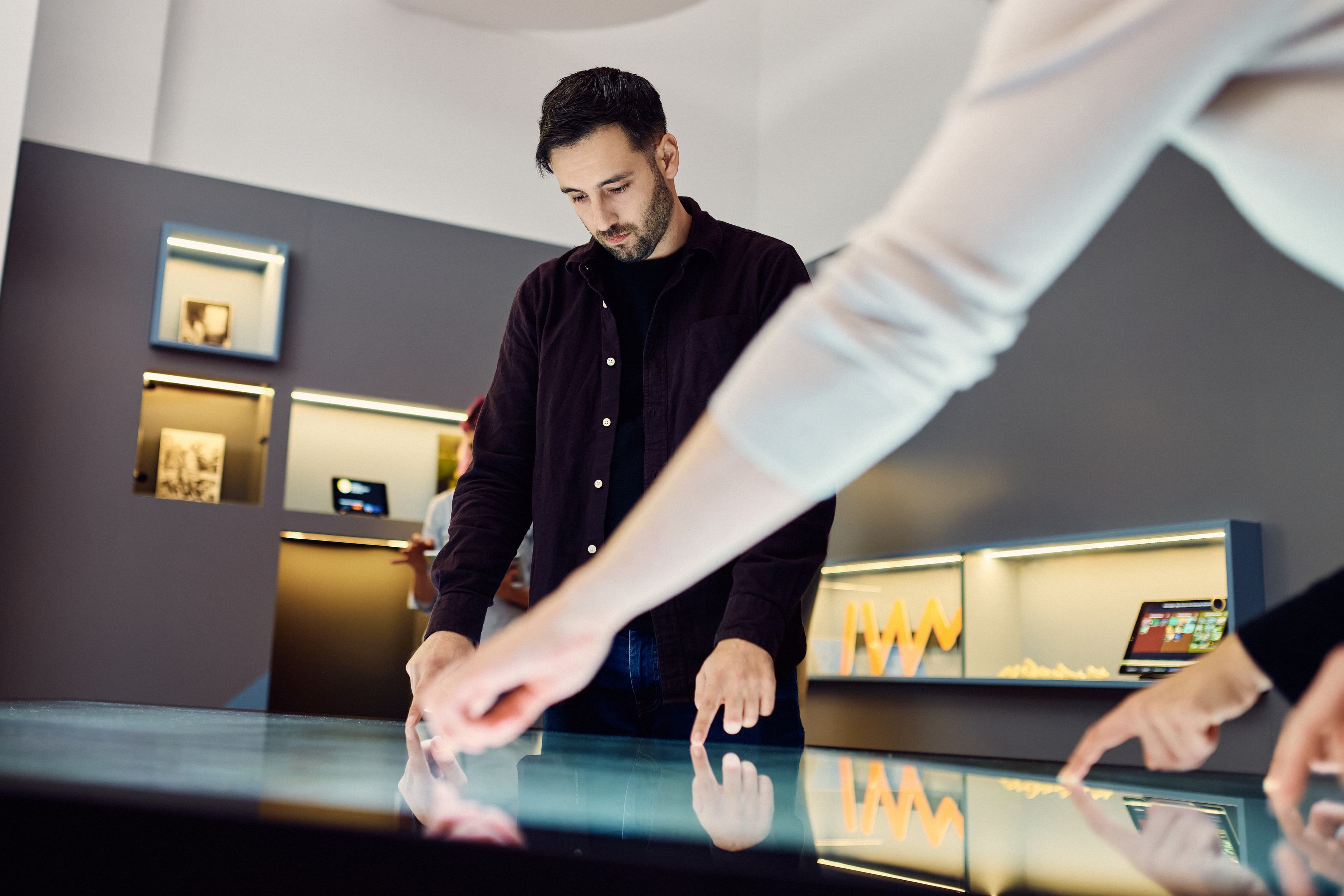 IWM scientists using the multi-touch table