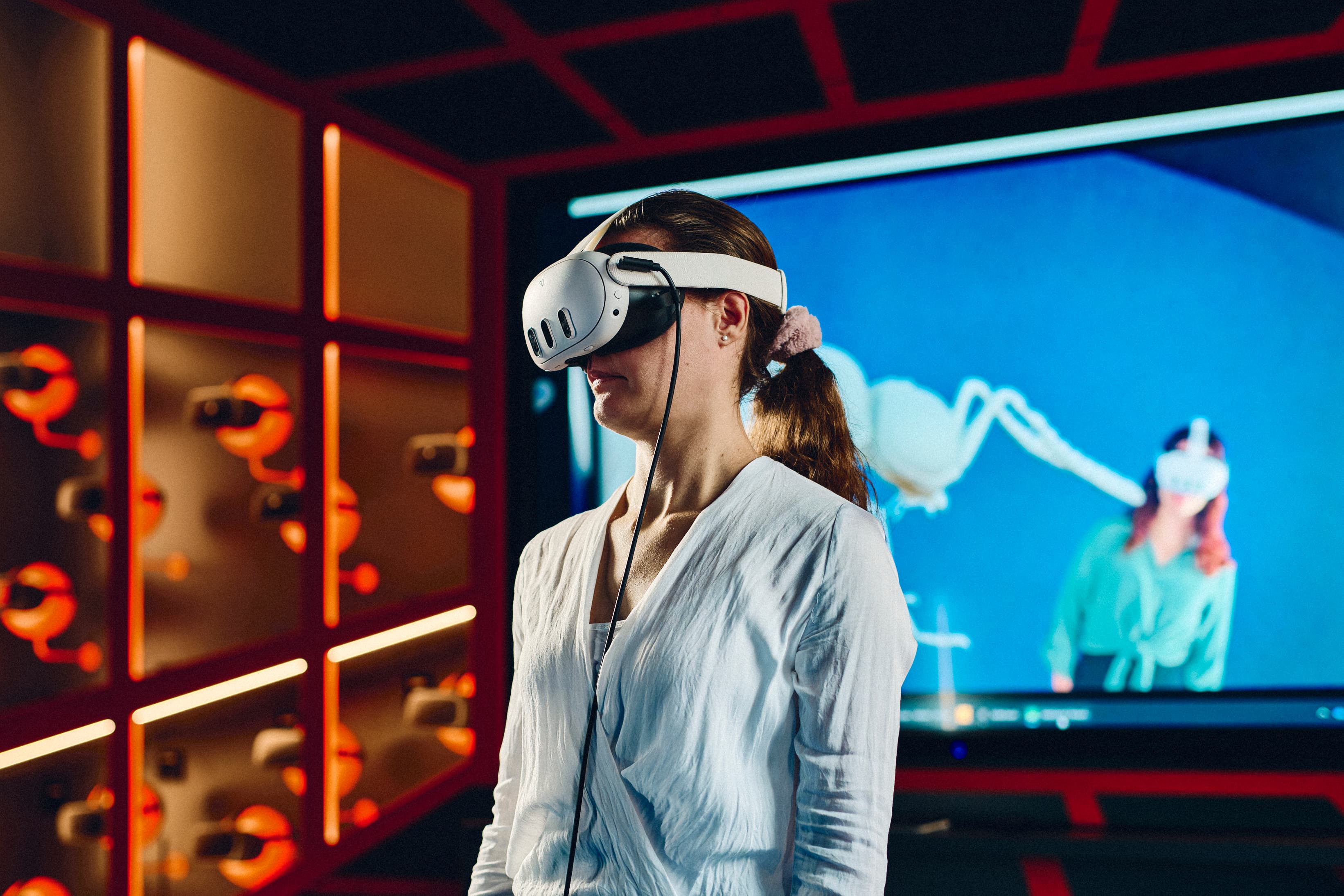 A person with VR glasses in the Mixed Reality Lab