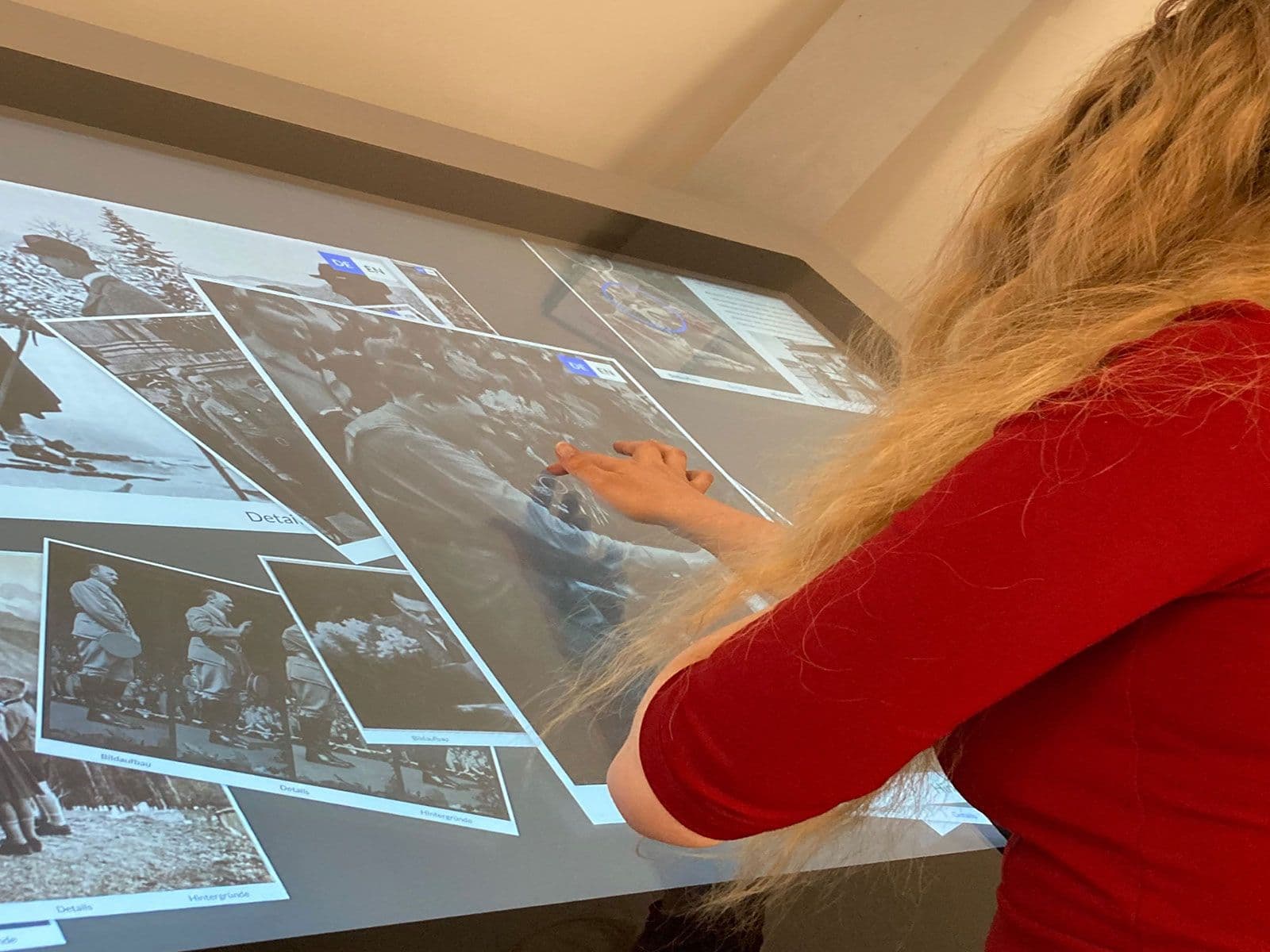 A person using the multi-touch table