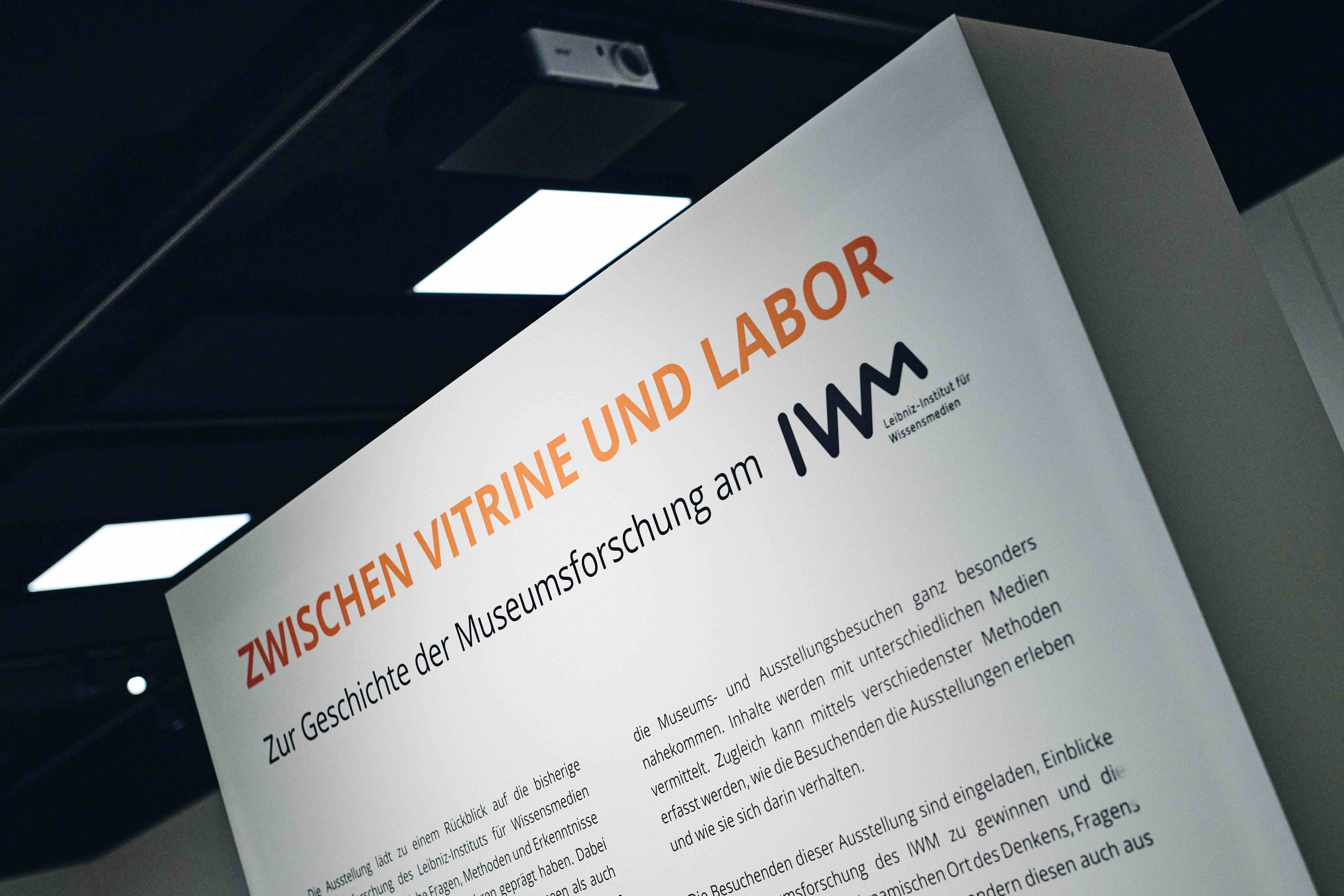Exhibition panel titled “Between Showcase and Laboratory: The History of Museum Research at the IWM” as part of the MuseumLab exhibition